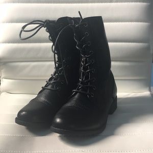 Women’s black high top boots